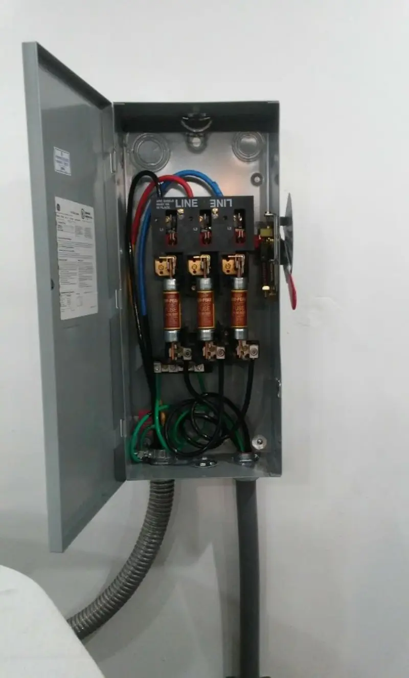 Three-phase disconnect switch installed for Smoke Detector Installation in Eldon